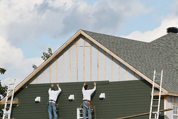 Professional Siding technician working in Woodstock, GA